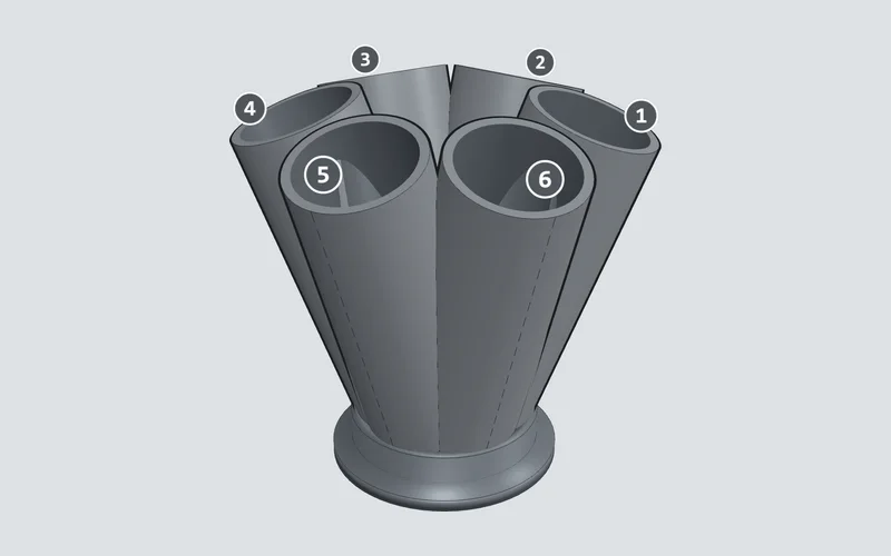 A six-runner slash-cut merge collector on a V-band flange, drawn in 3D by the Merge Collector Calculator